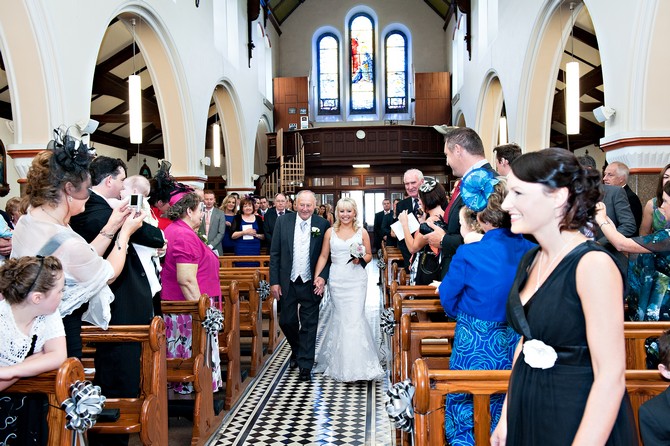 bride and father walking up the aisle